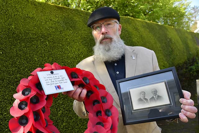 Neale Jagoe pictured with a photo of his great grandparents Willam and Elizabeth Jagoe from Co Cork and the wreath he laid in memory of the 13 boys and men murdered in the Bandon Valley Massacre they escaped. 
Picture By: Arthur Allison/Pacemaker Press.