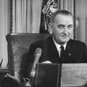 2nd December 1963:  American President Lyndon Baines Johnson addresses the nation on his first thanksgiving day television programme, broadcast from the executive offices of the White House.  (Photo by Keystone/Getty Images)