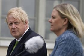 Prime Minister Boris Johnson and Swedish Prime Minister Magdalena Andersson during a joint press conference in Harpsund, the country retreat of Swedish prime ministers.