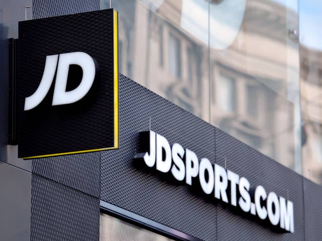 File photo dated 06/01/16 of a shop sign for JD Sports in central London, as JD Sports has lifted its profit forecasts again on the back of strong sales despite shortages of key footwear lines. The retailer saw shares lift higher after it said it was "reassured" by trading over the 14 weeks to May 7. Issue date: Thursday May 12, 2022. It reported like-for-like sales for the period had been more than 5% higher than the same period last year.