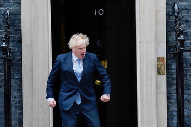 Prime Minister Boris Johnson, see outside 10 Downing Street on Friday, will fly into Belfast on Monday. Photo: Victoria Jones/PA Wire