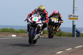 Glenn Irwin (Honda Racing) leads Davey Todd (Milenco by Padgett's Honda) in the first Superbike race at the North West 200 on Saturday.