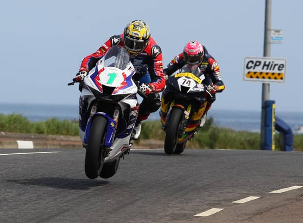Glenn Irwin (Honda Racing) leads Davey Todd (Milenco by Padgett's Honda) in the first Superbike race at the North West 200 on Saturday.