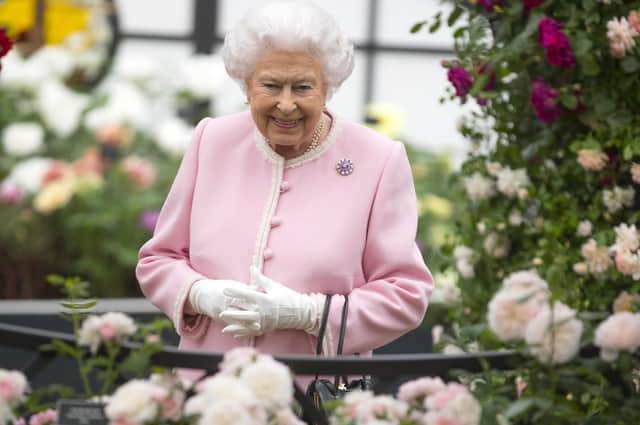The Queen admiring roses at the RHS Chelsea Flower Show in 2018.
