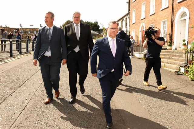 DUP leader Sir Jeffrey Donaldson (right), with his colleagues Gavin Robinson MP (centre), and Edwin Poots MLA(left), after speaking to the media following their meeting with Boris Johnson at Hillsborough Castle. The DUP / TUV were clear in their manifestos and have a mandate of resistance. Photo McBurney/PA Wire