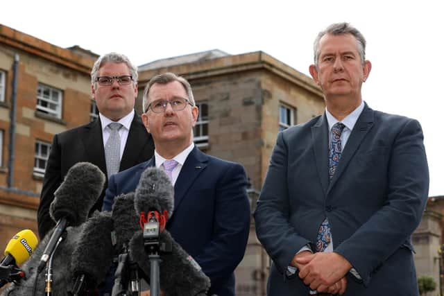 Sir Jeffrey Donaldson (centre), speaks to the media alongside Gavin Robinson (left), and Edwin Poots (right), after their meeting with Prime Minister Boris Johnson at Hillsborough Castle, during the Prime Minister's visit by to Northern Ireland for talks with Stormont parties. Picture: Liam McBurney/PA Wire