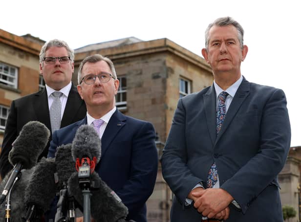 Sir Jeffrey Donaldson (centre), speaks to the media alongside Gavin Robinson (left), and Edwin Poots (right), after their meeting with Prime Minister Boris Johnson at Hillsborough Castle, during the Prime Minister's visit by to Northern Ireland for talks with Stormont parties. Picture: Liam McBurney/PA Wire