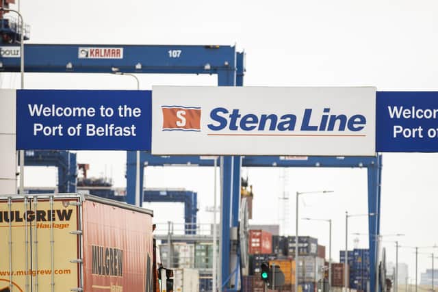 A haulage lorry drives under a Stena Line sign at the Belfast Harbour Estate welcoming travellers to the Port of Belfast. Picture date: Tuesday May 17, 2022.