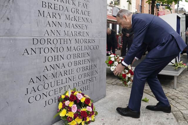 Taoiseach Micheal Martin lays a wreath in Talbot Street Dublin during a ceremony marking the 48th anniversary of the 1974 Dublin and Monaghan bombings.