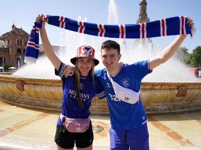 Rangers fans Dion Young (left) and Callum Wilson in the Plaza de Espana before the UEFA Europa League Final at the Estadio Ramon Sanchez-Pizjuan, Seville.