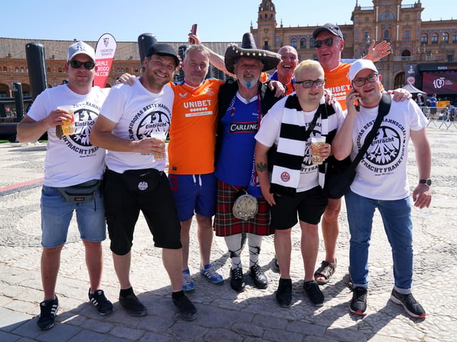 Rangers and Eintracht Frankfurt fans in the Plaza de Espana before the UEFA Europa League Final at the Estadio Ramon Sanchez-Pizjuan, Seville.
