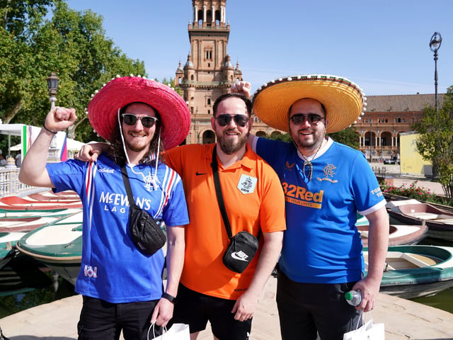 Rangers fans Lee Cupples (left), Darren McGill and Stephen McGill in the Plaza de Espana before the UEFA Europa League Final at the Estadio Ramon Sanchez-Pizjuan, Seville.