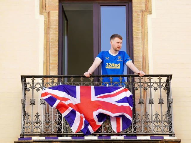 A Rangers fan in the old town of Seville, ahead of the UEFA Europa League Final at the Estadio Ramon Sanchez-Pizjuan. Picture date: Wednesday May 18, 2022. PA Photo.