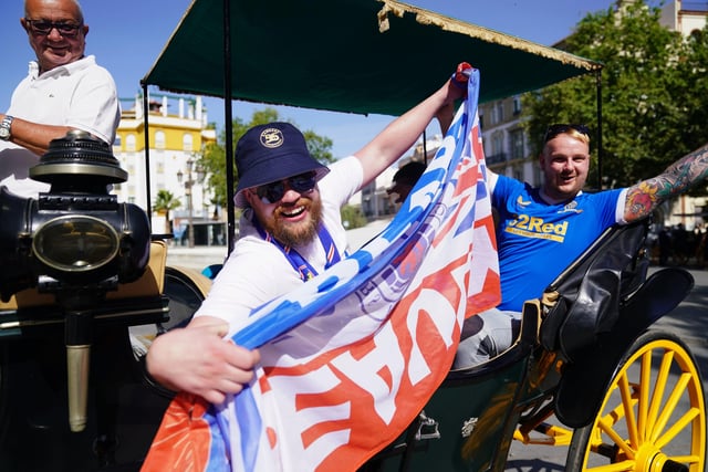 Rangers fans ride by carriage in the old town of Seville, ahead of the UEFA Europa League Final at the Estadio Ramon Sanchez-Pizjuan. Picture date: Wednesday May 18, 2022. PA Photo