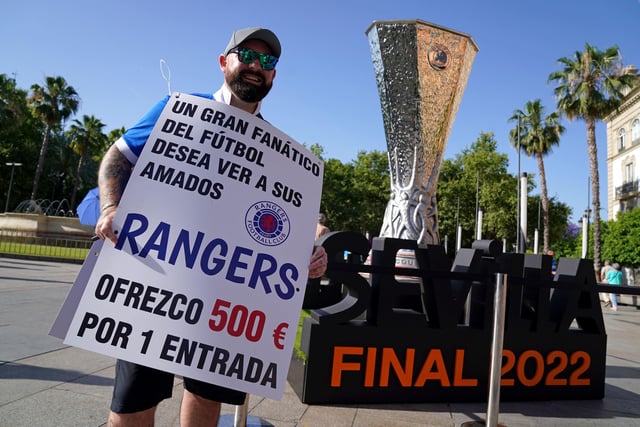Rangers fan Andrew Jordan in the Puerta de Jerez square asking for tickets before the UEFA Europa League Final at the Estadio Ramon Sanchez-Pizjuan, Seville.