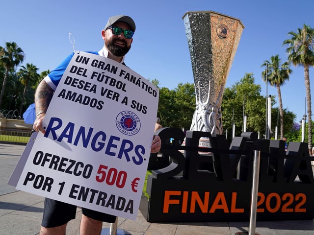 Rangers fan Andrew Jordan in the Puerta de Jerez square asking for tickets before the UEFA Europa League Final at the Estadio Ramon Sanchez-Pizjuan, Seville.