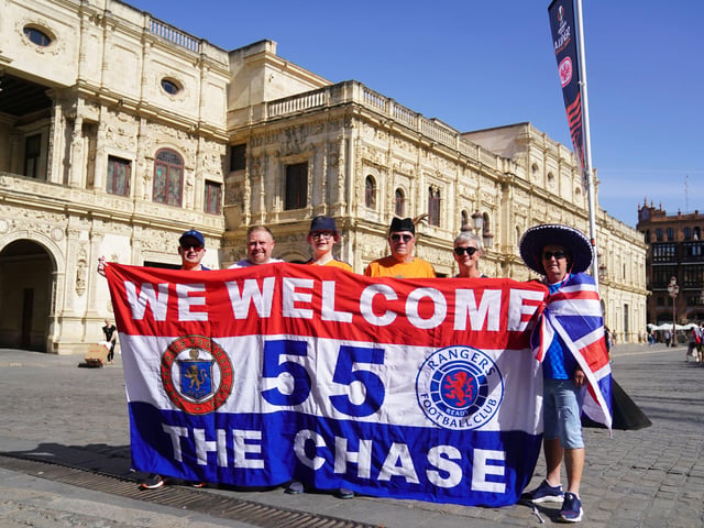 Rangers fans pose for a picture in the old town of Seville, ahead of the UEFA Europa League Final at the Estadio Ramon Sanchez-Pizjuan.