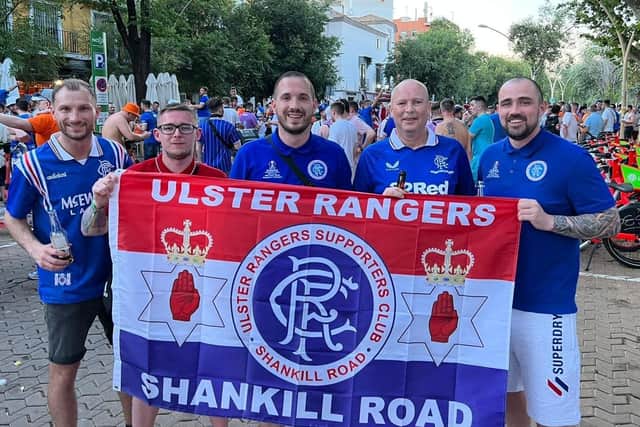 Shankill Road Rangers fan Mark Foster (centre) with friends in Seville for the Europa League final