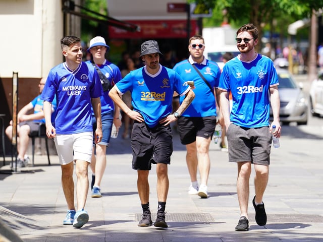 Rangers fans walk through the centre of Seville, ahead of the UEFA Europa League Final at the Estadio Ramon Sanchez-Pizjuan.