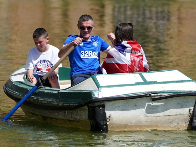 Rangers fans take a boat out in the Plaza de Espana before the UEFA Europa League Final at the Estadio Ramon Sanchez-Pizjuan, Seville.