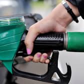 File photo dated 15/08/13 of a view of a person using a petrol pump, as inflation fell sharply to a 12-year low of 1% in November as lower food and petrol prices kept a lid on the cost of living. PRESS ASSOCIATION Photo. Issue date: Tuesday December 16, 2014. The Consumer Price Index (CPI) measure of inflation dropped more steeply than expected from 1.3% in October, the Office for National Statistics (ONS) said. See PA story ECONOMY Inflation. Photo credit should read: Nick Ansell/PA Wire