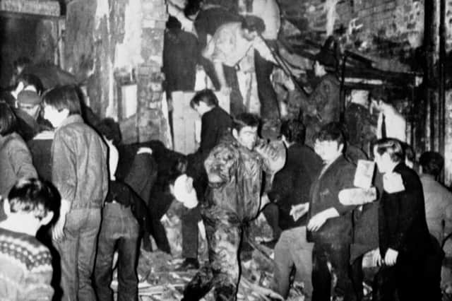 The aftermath of the bomb blast at McGurk's bar in North Queen Street, Belfast
