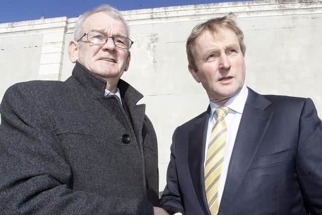 Kingsmill Massacre survivor Alan Black, left, shakes hands with then Taoiseach Enda Kenny during a meeting in Bessbrook in 2015 in which the Irish premier promised full transparency from Irish state files on the atrocity. Nw in 2022, Mr Black says all Dublin has handed over has been newspaper clippings, despite claims by current Taoiseahc Micheal Martin that he has no outstanding legacy cases to deal with. Photo Aidan O'Reilly/Pacemaker Press
