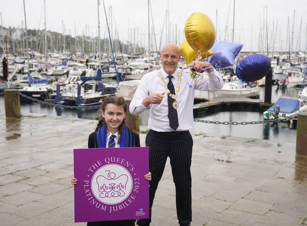 Mayor of Ards and North Down, Mark Brooks,and Melissa Doherty, 12, a pupil at Glenlola Collegiate Girls School, at Bangor Marina celebrating the announcement that Bangor has been awarded city status to mark the Queen's Platinum Jubilee