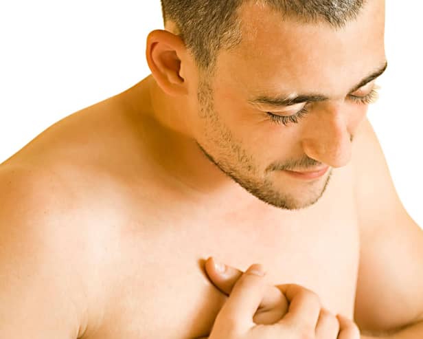 Many symptoms of male breast cancer are similar to those experienced by women