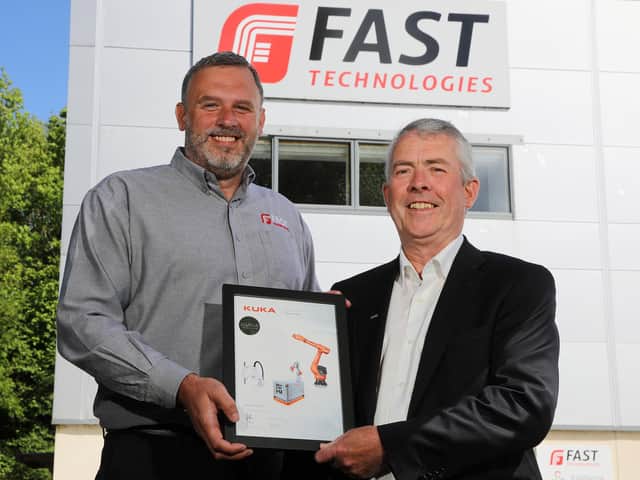 Colin Spence, director at FAST Technologies pictured with Brian Cooney, managing director, KUKA Ireland