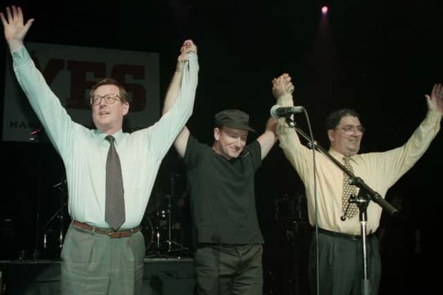 UUP leader David Trimble, U2 singer Bono and SDLP leader John Hume campaigned for the success of the Good Friday Agreement in 1998.