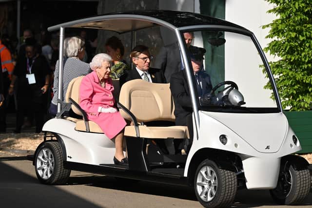 The Queen sitting in a buggy during a visit by members of the royal family to the RHS Chelsea Flower Show 2022. Photo: Paul Grover/Daily Telegraph/PA Wire