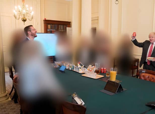 Picture dated 19/06/20 issued by the Cabinet Office showing Prime Minister Boris Johnson (right) at a gathering in the Cabinet Room in 10 Downing Street on his birthday