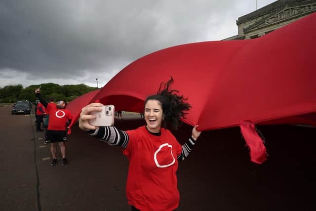 Irish language campaigners from An Dream Dearg outside Stormont today