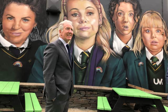 Congressman Richard Neal visits the Derry Girls mural as he leads a Congressional delegation on a visit to Londonderry