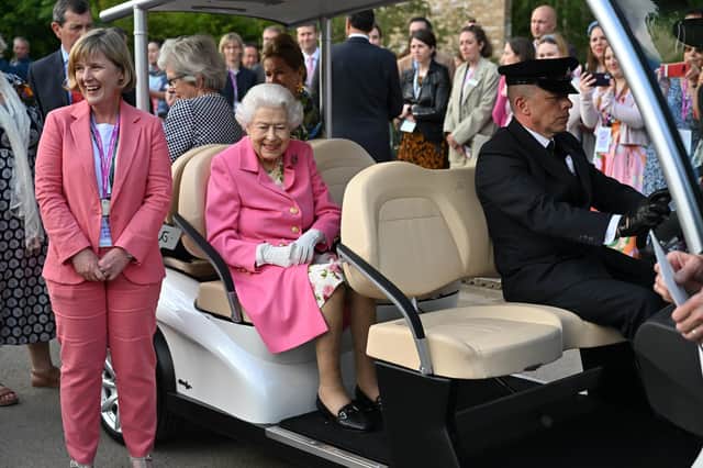 Queen Elizabeth sitting in a buggy during a visit by members of the royal family to the RHS Chelsea Flower Show 2022 last week