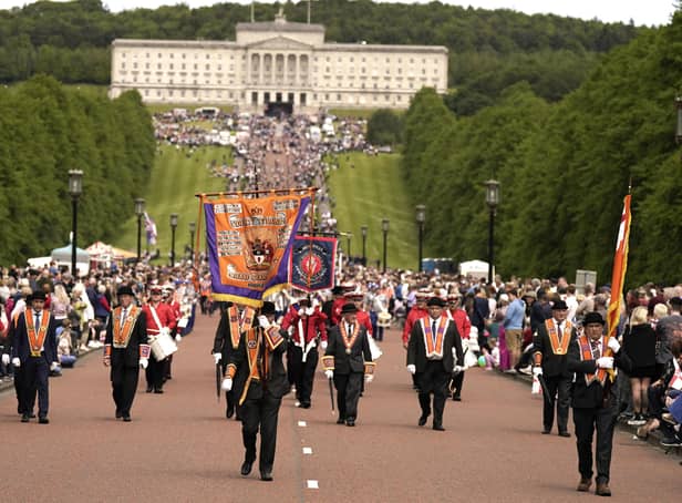 Members of the Grand Orange Lodge of Ireland during the start of the Northern Ireland centenary parade from Stormont towards City Hall in Belfast, to commemorate the creation of Northern Ireland. Photo: Niall Carson/PA Wire