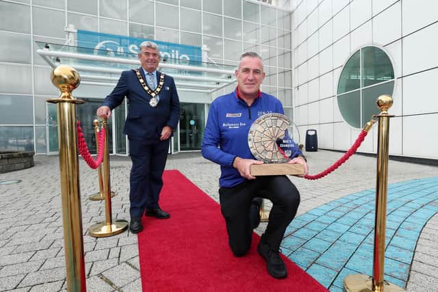 World Darts Federation (WDF) champion, Neil Duff pictured with the Mayor of Antrim and Newtownabbey, Councillor Billy Webb
