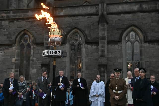 A Platinum Jubilee beacon is lit after a service of thanksgiving, at St. Macartin's Cathedral Enniskillen, Co. Fermanagh, on day one of the Platinum Jubilee celebrations. Over 3,000 towns, villages and cities throughout the UK, Channel Islands, Isle of Man and UK Overseas Territories, and each of the capital cities of Commonwealth countries are lighting beacons to mark the Jubilee. PA Photo. Picture date: Thursday June 2, 2022. See PA story ROYAL Jubilee. Photo credit should read: Oliver McVeigh/PA Wire