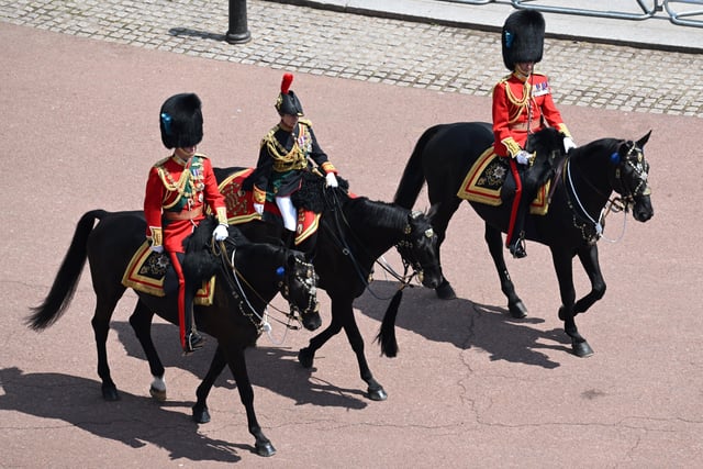 (from left to right) the Duke of Cambridge, in his role as Colonel of the Irish Guards and the Princess Royal in her role as Colonel of the Blues and Royals, ride horses back along the Mall towards Buckingham Palace during the Trooping the Colour ceremony at Horse Guards Parade, central London, as the Queen celebrates her official birthday, on day one of the Platinum Jubilee celebrations. Picture date: Thursday June 2, 2022.
