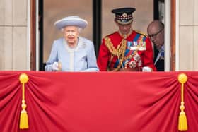 Queen Elizabeth II and the Duke of Kent watching the Royal Procession from the balcony at Buckingham Palace following the Trooping the Colour ceremony in central London, as the Queen celebrates her official birthday, on day one of the Platinum Jubilee celebrations. Picture date: Thursday June 2, 2022.