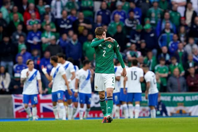 Northern Ireland’s Conor Bradley (centre) appears dejected after Greece’s Anastasios Bakasetas scores during the UEFA Nations League match at Windsor Park