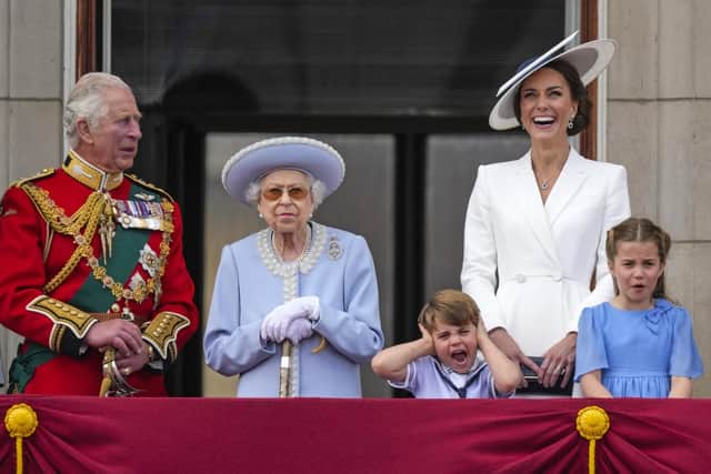 The Prince of Wales, Queen Elizabeth II, Prince Louis, the Duchess of Cambridge and Princess Charlotte on the balcony of Buckingham Palace to view the Platinum Jubilee flypast, as the Queen celebrates her official birthday on day one of the Platinum Jubilee celebrations.