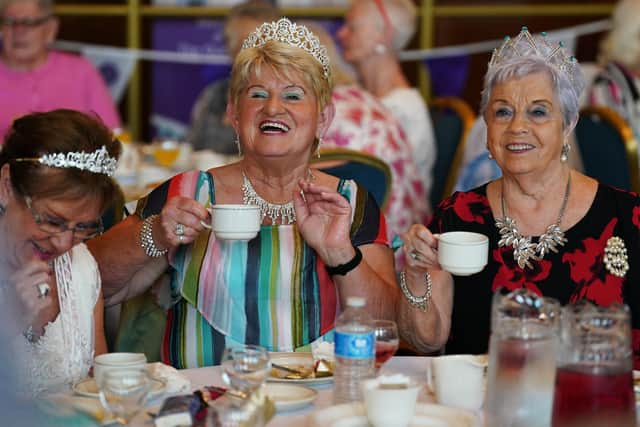 People enjoying a Queen's Platinum Jubilee Tea Dance at Belfast City Hall on Friday