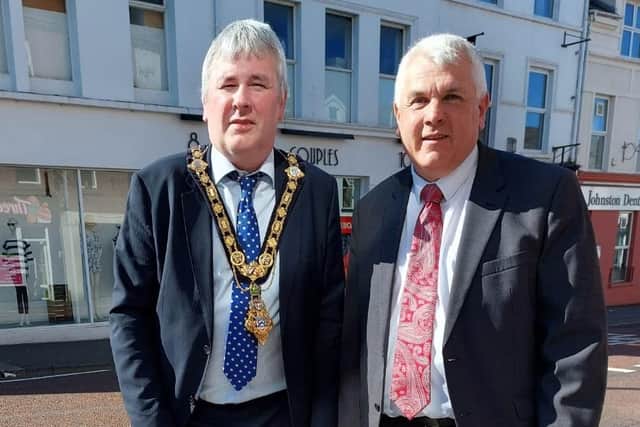 The Mayor of Causeway Coast and Glens Borough Council Councillor Richard Holmes pictured at the site of the memorial stone on Railway Road in Coleraine, along with Councillor Alan McLean who first proposed the motion for the stone.
