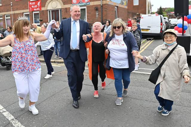 Minister of State for NI Conor Burns joins in the Platinum Jubilee  celebrations on the Donegal road in Belfast. Photo: Stephen Hamilton/Presseye