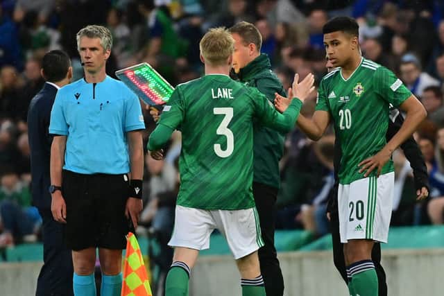 Shea Charles (right) making his Northern Ireland debut against Greece at Windsor Park. Pic by Pacemaker.