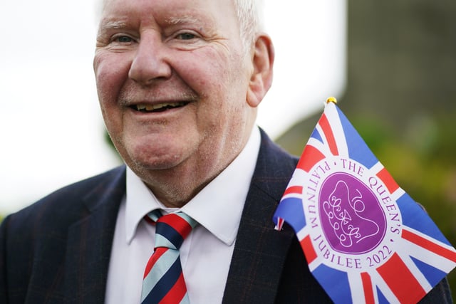 George McGaffin wears a jubilee flag in his lapel as he attends a picnic at St. Bartholomew's Parish Church, Newry, as part of the Big Jubilee Lunch as celebrations continue across Northern Ireland for the Queen's Platinum Jubilee. Picture date: Sunday June 5, 2022.