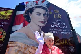The Shankill Road’s 'queen for a day' at the unveiling of a mural of the real Queen on Saturday. Picture: Colm Lenaghan/ Pacemaker