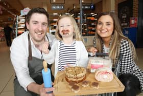 Timothy Graham, business development manager at Grahams Bakery with daughter three-year old Ivy Graham and Ciara Moran, buyer at Lidl Ireland and NI